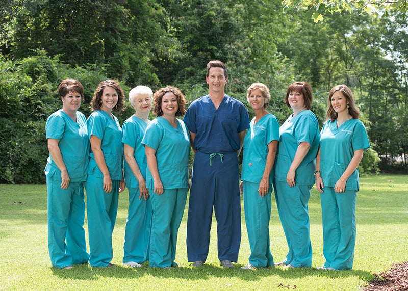 Dental team at Belk Ditcharo Dental standing outside