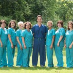 Dental team at Belk Ditcharo Dental standing outside
